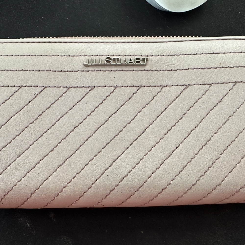 Pretty Jill Stuart long mauve zippy wallet with lots of compartments